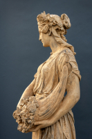 Een mid 19de eeuws terracotta beeld Flora